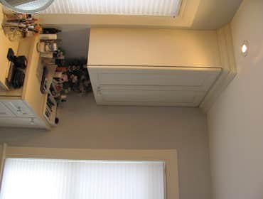 Frey Diamond cabinetry painted in a Coconut finish, countertops by others