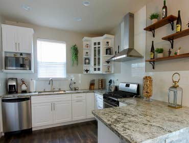 Natomas - kitchen with walk-in pantry. Kitchen Remodel. Semi - Custom Cabinets
Features:
1. Garbage Pull out to the right of the sink.
2. Upper cabine