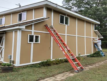 Photos by Christian Renovation Network #1 painting interior & exterior, sanding - refinishing floors and installation of windows , roofing repairs