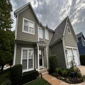 New roof in Olathe, KS using Tamko Titan shingles in weatherwood color.