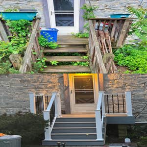 Historic Stone Barn Exterior & Deck Renovation Deck reface and exterior upgrades for a 100+ year-old stone barn conversion in Mechanicsburg, PA....