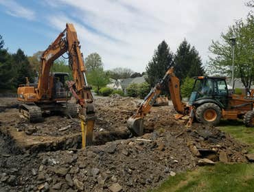 Hammering Rock Hammering rock out of footers and basement areas.