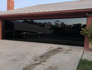 Modern One-Way Glass Garage Doors