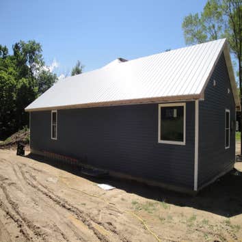 Finished siding and roof