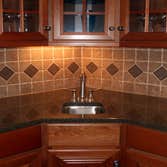 Kitchen Tile Backsplash This is a wonderful kitchen any home owner would love! Services included free estimate, initial consultation, design samples an