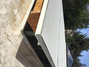 New overhead roof structure by T&H Homebuilders.Inc