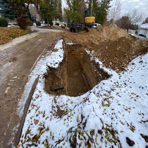 Photos by Asap Inc Replacement Septic System, Trenches being dug out.