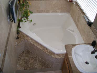 master corner bath tub
