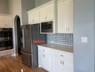 Photos by Austin Fine Finish Painting LLC #1 46 Piece Cabinet repaint. Benjamin Moore Satin Impervo color matched to SW Tricorn Black. Photos taken d