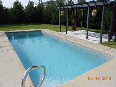 Thompson Pool This is a pool we maintain on a weekly basis. It is just beautiful and ready for a swim!