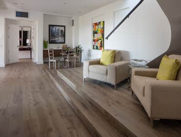 Tiburon house Install hardwood flooring throughout house - wide plank white oak with cured urethane finish