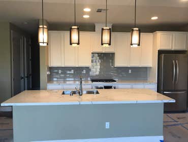 Photos by Subias Granite & Marble #3 Calacatta Statuary quartz MSI surfaces and glass mosiac tile.