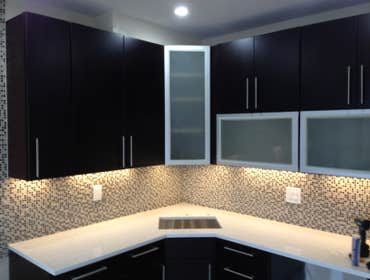 2 Bedroom + 2 1/2 Bath Duplex Condo We gutted everything on this project besides the walls in this project. We had radiant heating in all the flooring 