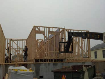 Photos by Teagan Homes #1 New construction of two townhomes sold to individuals for about $450000 each unit. Profit margin was over $250,000 in less th