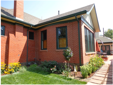 Swooped roof and bowed wall