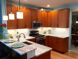 Rockville Kitchen Remodel Our clients asked for more fluidity, so we removed the existing bulkhead, added LED recessed lighting, and moved the main en