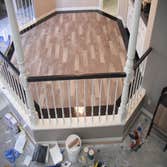 Photos by Floored #1 8 inch Galaxy Granite border.4 ix 24 inch Porcelian plank tile inlay.