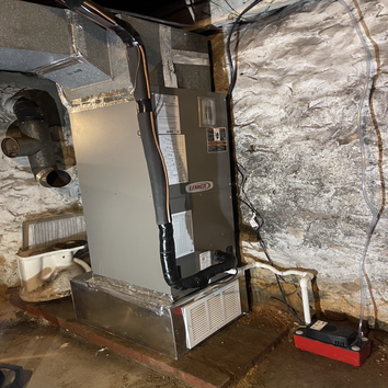 Photos by Golden Dragon Management & Services Inc #1 Replacement of old forced air oil burner with heat pump system. Chimney will be capped of, and ret