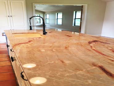 Chandler Kitchen Renovation Features Quartzite Counters, new cabinets, lighting, fixtures and appliances. Renovated in preparation for listing home for