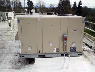 American Standard installation residential This is a recent installation of an American Standard heating and cooling system in a residential setting.