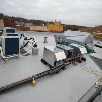 Photos by Bella Roofing #1 Install new TPO flat roof!