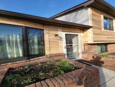 Photos by 614 Exteriors, LLC #13 Removed old board & batten siding and install cedar siding.