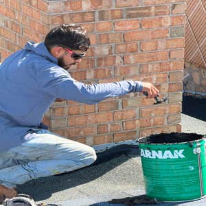 Detail-oriented flashing and masonry waterproofing repair