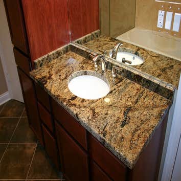 Brandon Pl in Wheeling, IL Full bathroom remodeling with custom shower, whirlpool tub, heated floor, towel warmer, and much more.