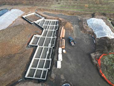 Photos by Aspire Homes Inc #3 Custom home with roof insulation, exterior insulation, solar, geothermal and pool.