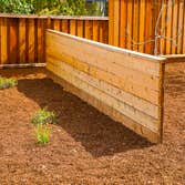 Project in Stanford This landscaping project is a complete transformation of the front and back yard. One of the highlights is the decorative boulders,