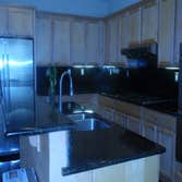 Mountain House, Kitchen This is a beautiful kitchen,custom designed, and materials selected by owner but we built it.
Looks Beautiful......