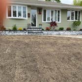 Ground leveling and lawn seeding