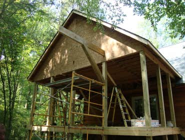 Photo(s) from Palmetto Contracting Services custom log home built turm key from the ground up-added custom features