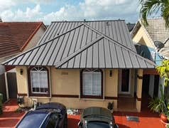 Photos by Gold Star Miami Corp #1 metal roof panels all are . 25 years warrantee