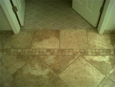 Stone tile with Berber diamond pattern carpet