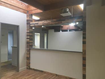 Hicks Financial Tenant improvement. New reception area and lobby. New kitchen cabinets. New flooring and paint.
