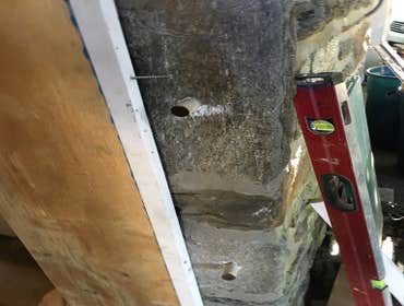 Photos by Steve Burnsed General Contracting #11 Installed new door and storm door Had to remove old door and drill 2” holes in the stone to set in wood
