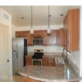 Custom House This a beutiful 1500 sq. ft.spec house we did. 3 bdrm, 2 bath, rounded walss, copper sinks, travertine flooring, granite countertops.