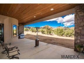 Photos by Sequoia Homes LLC #1 This Tuscan/Mediterranean style home is truly one of Mohave County's finest luxury homes. Over 1 acre of property in the