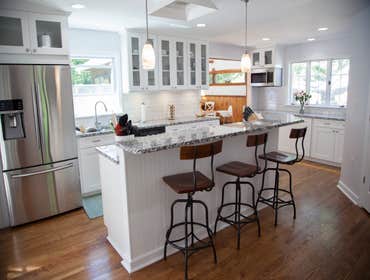 Brighter Kitchen! We took 2 rooms in this clients home and created 1 large, family friendly kitchen space. This kitchen has plenty of storage and works