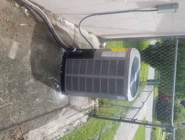 Photos by Island Air System Inc #1 Removal of old package unit attached to the outside of the house, along with the old ductwork. Install new ductwork 