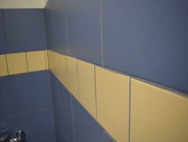 Richmond County Health Dept. Bath Remodel The Health Dept. project included 3 bathrooms needing new tile work, paint, regrout of flooring and minor plu