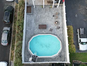 Photos by F&d Construction LLC #7 new patio paver around pool and demo stairs for deck