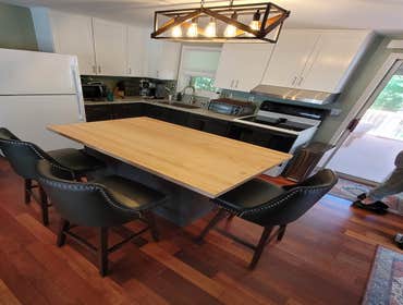 Kitchen Island Installation Our recent kitchen renovation customer liked our work and asked us to add an island with butcher block top.