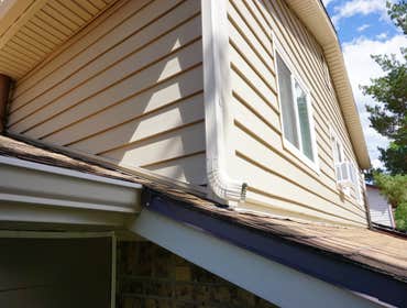 Photos by Exterior Recovery Co #1 Installed Structure foam backed vinyl siding with vinyl soffit and aluminum fascia.