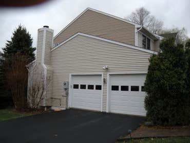 Photo(s) from Thibodeau Contracting, Inc. Garage doors and Barns