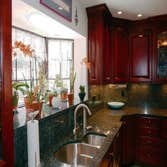 Kitchen Remodel Our client was looking for a kitchen remodel involving new countertops, appliiances, cabinet faces and painting.
