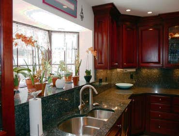 Kitchen Remodel Our client was looking for a kitchen remodel involving new countertops, appliiances, cabinet faces and painting.