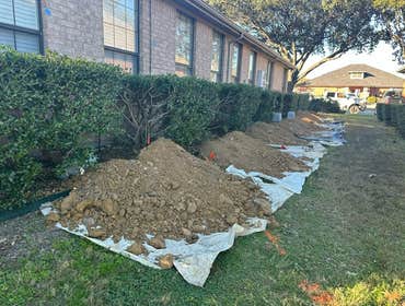 Foundation Repair in the Making This homeowner chose steel piers to support their home. We make sure to put our dirt on tarps so we leave your yard lo