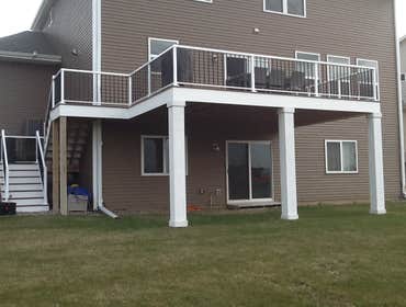 Photos by Custom Home Specialties Inc #2 Timber Tech maintenance free decks with powder coated railings.
